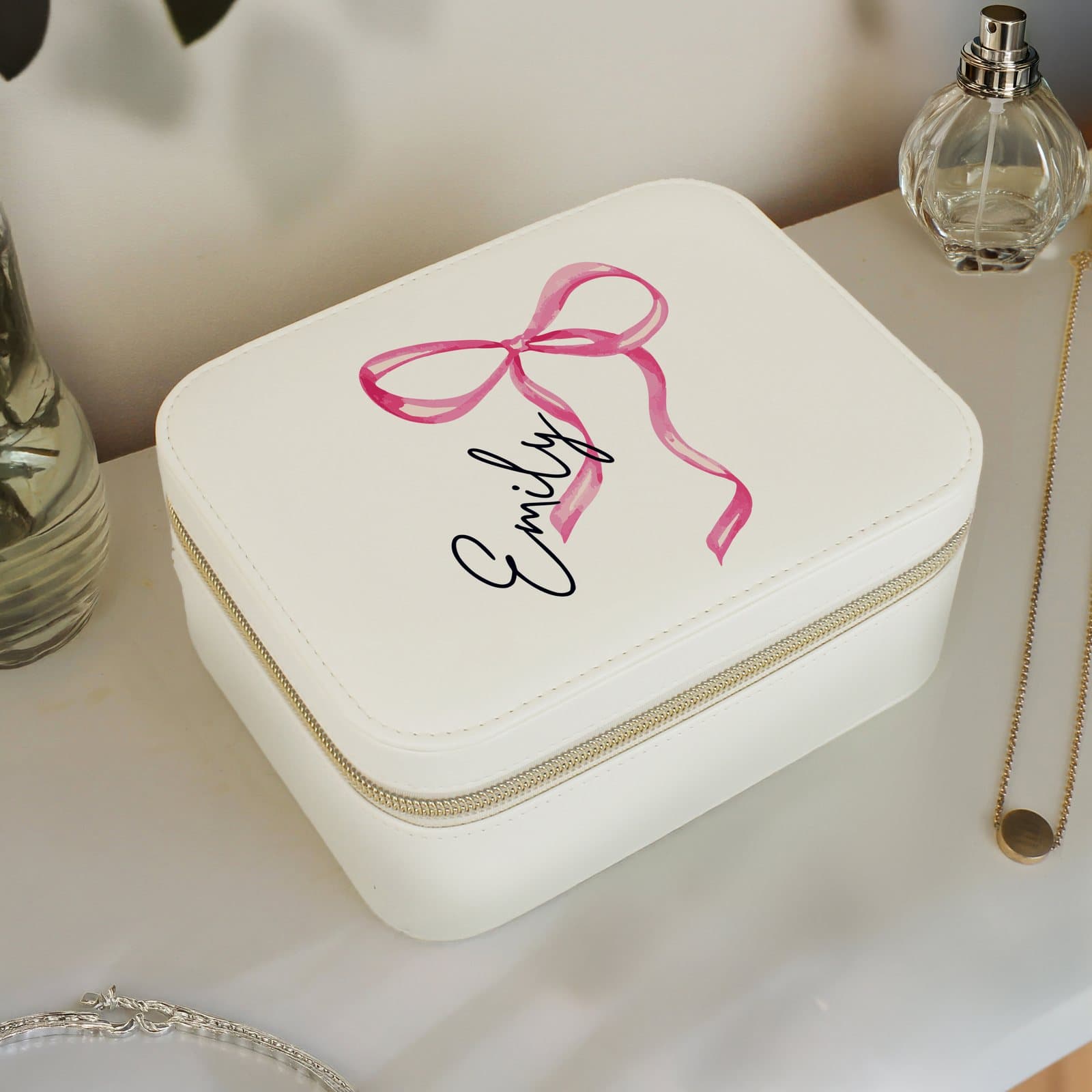 Faux leather jewellery box with a bow detail