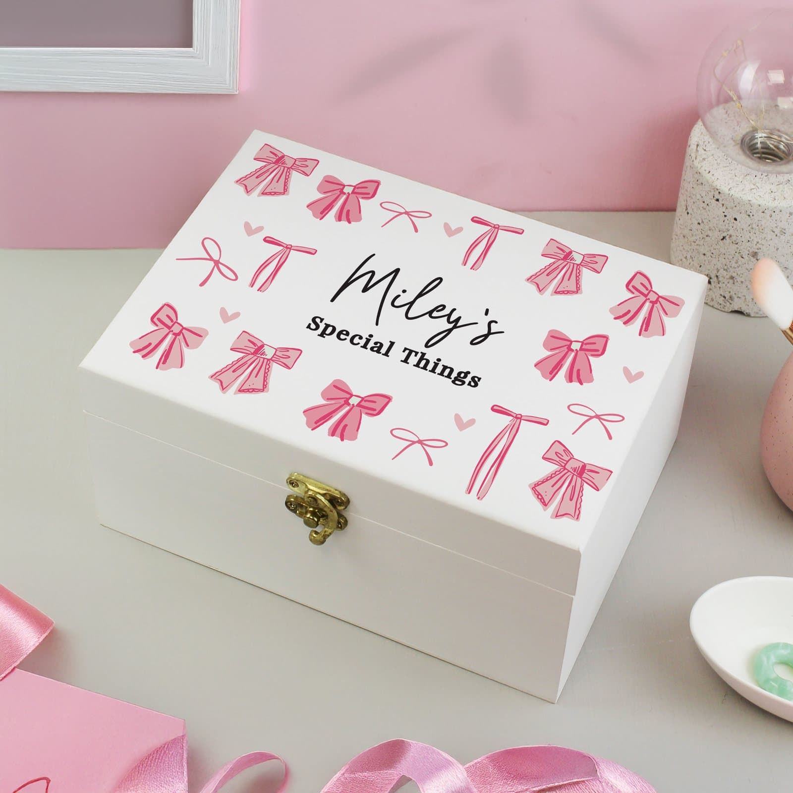 Hand painted wooden storage box with a bow detail