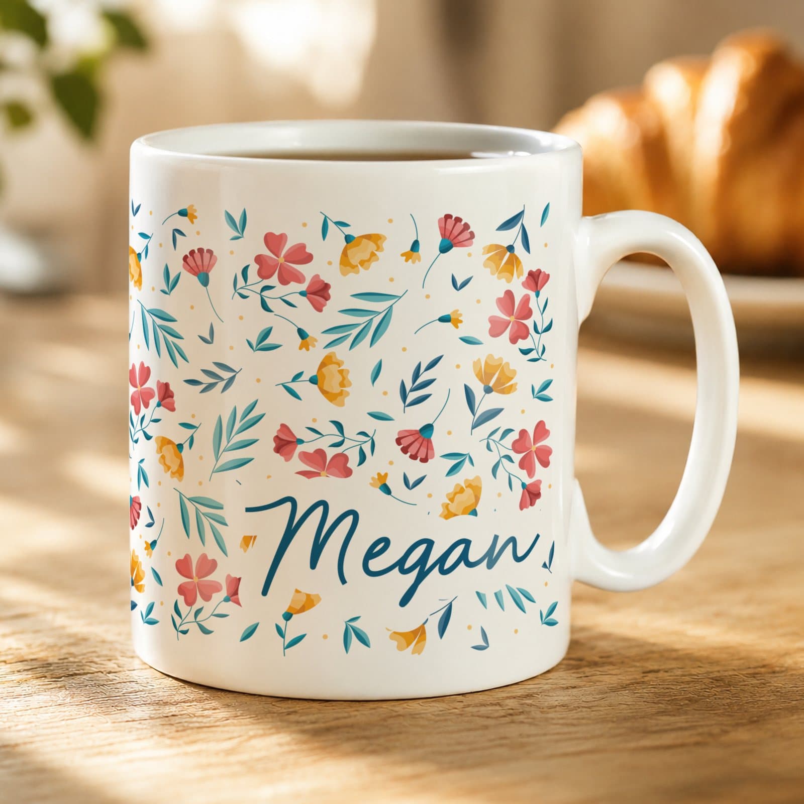 Ceramic mug with a bright floral pattern and a personalised name