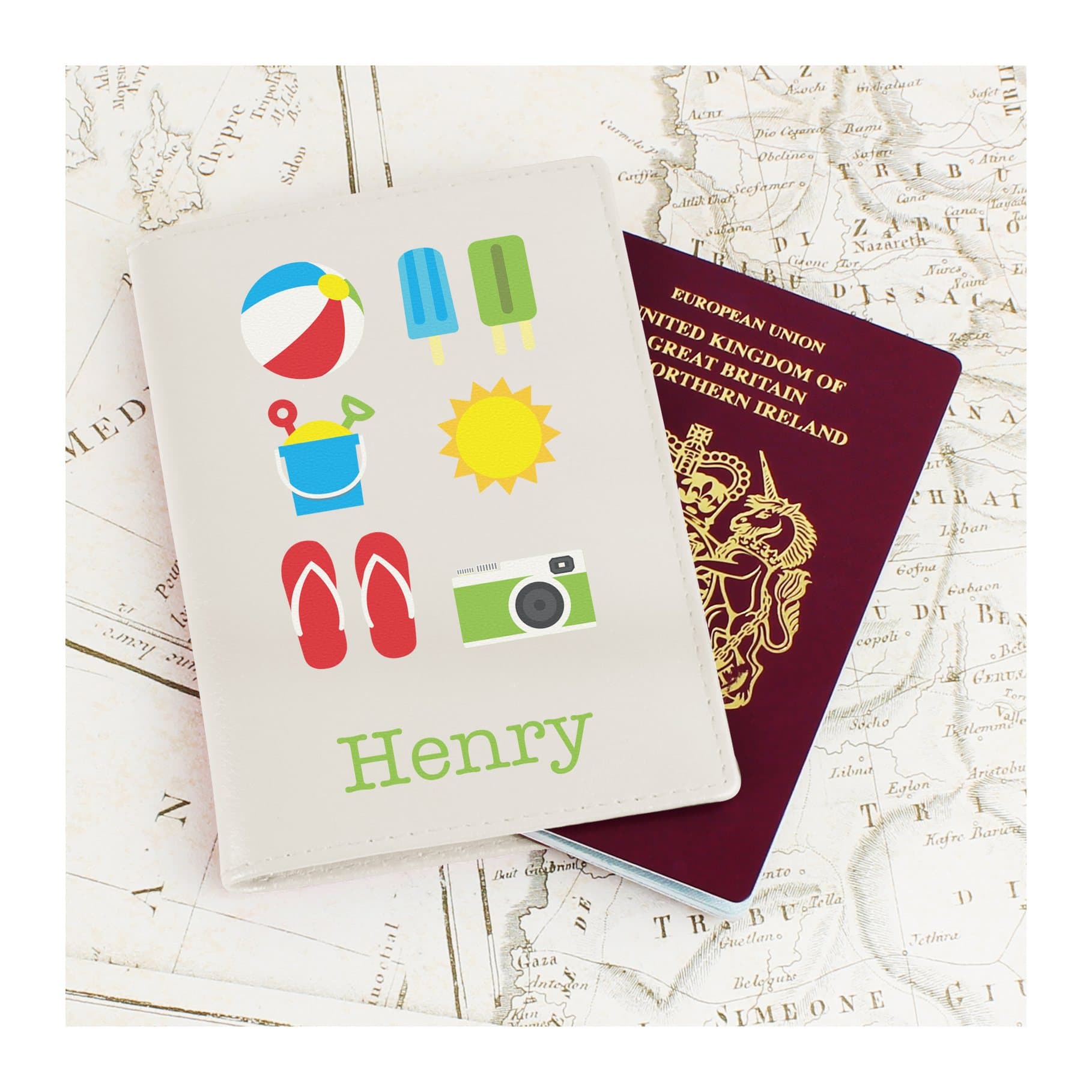 Cream leather passport holder with an illustration and a name below it