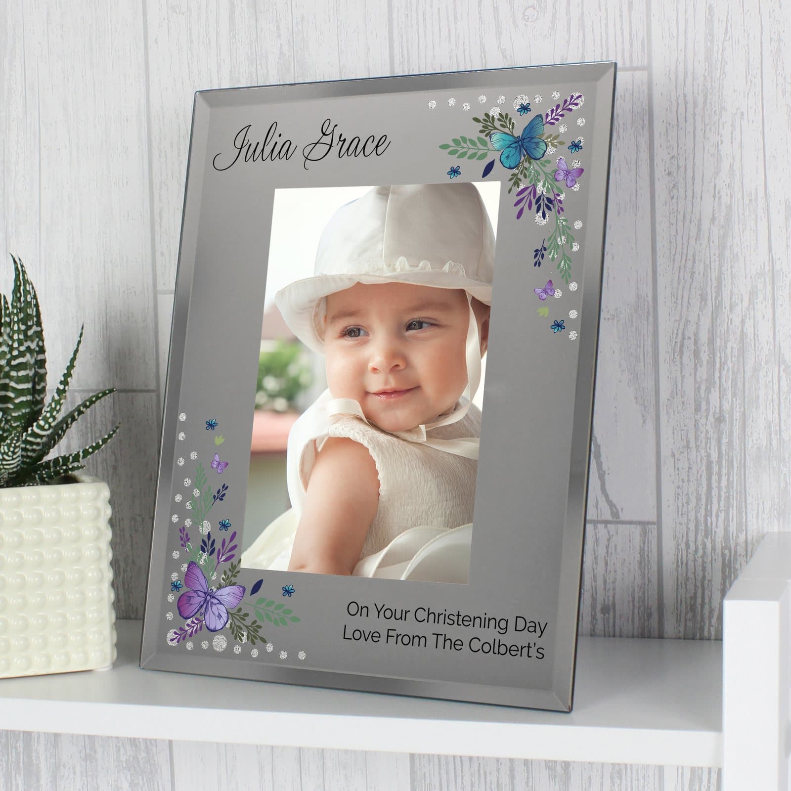 Butterfly diamante glass photo frame with a name above the photo and a message below
