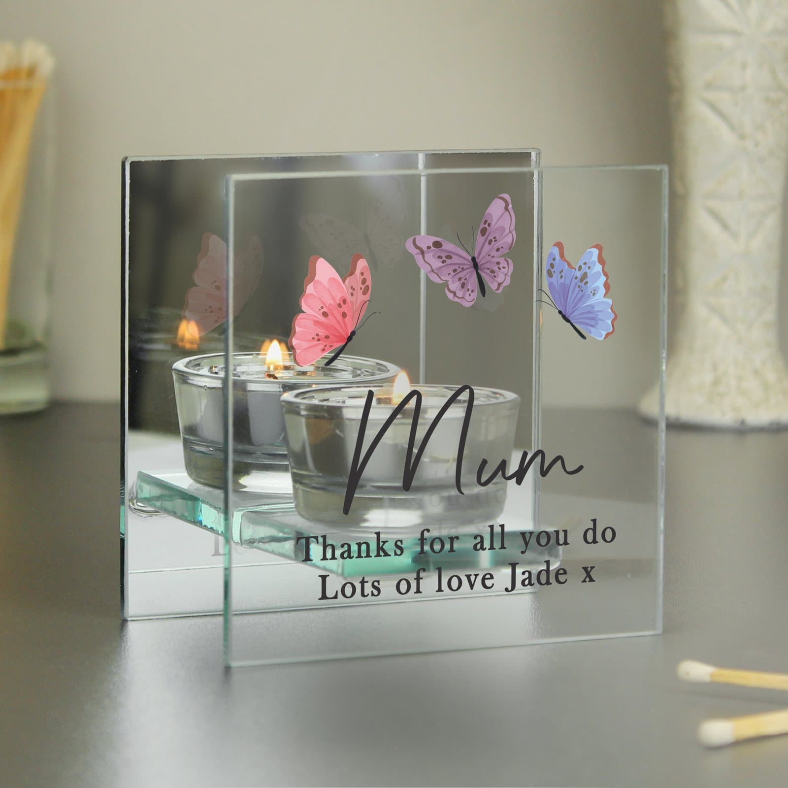 Glass butterfly tealight holder with three lines of text