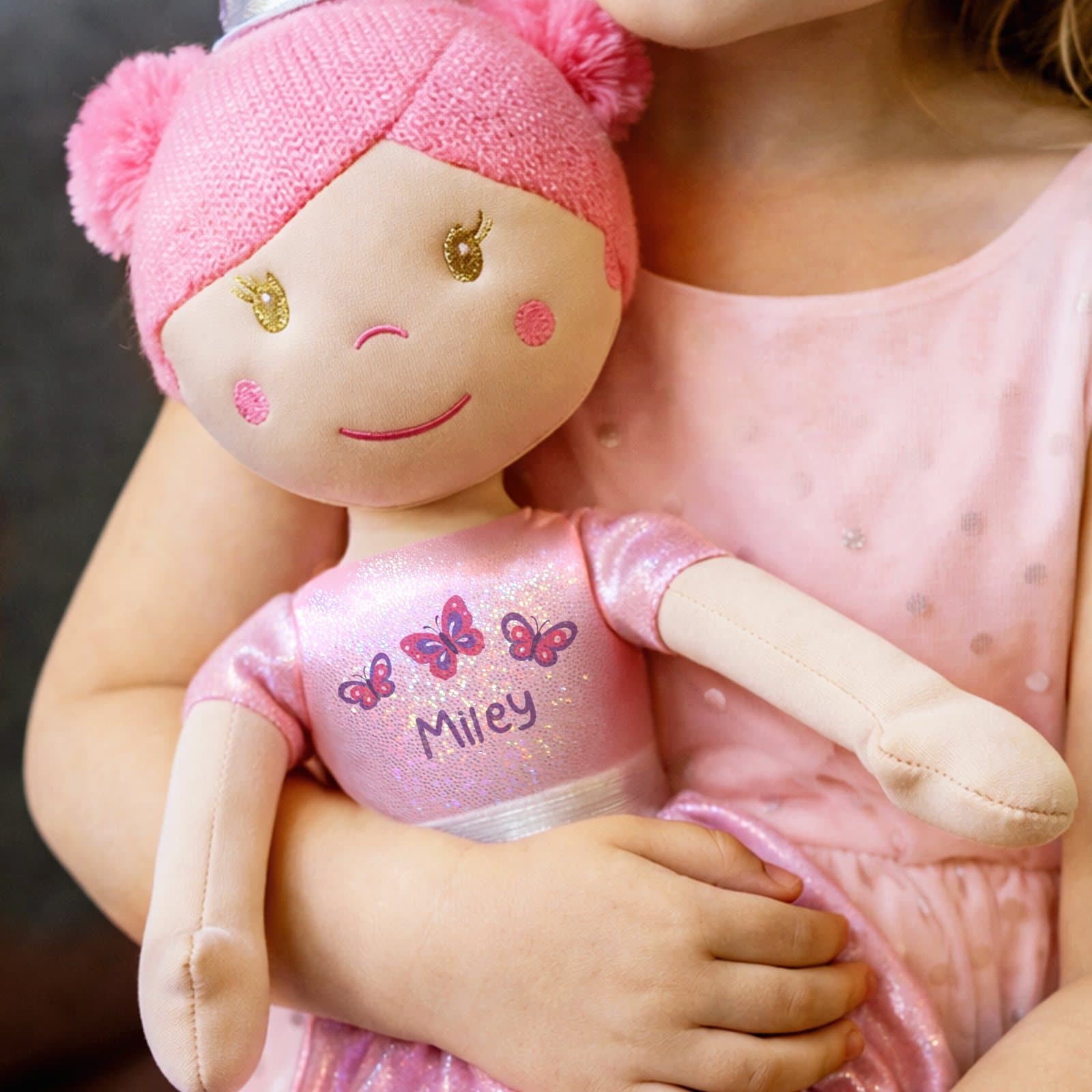 Rag doll in a ballerina outfit with a butterfly design