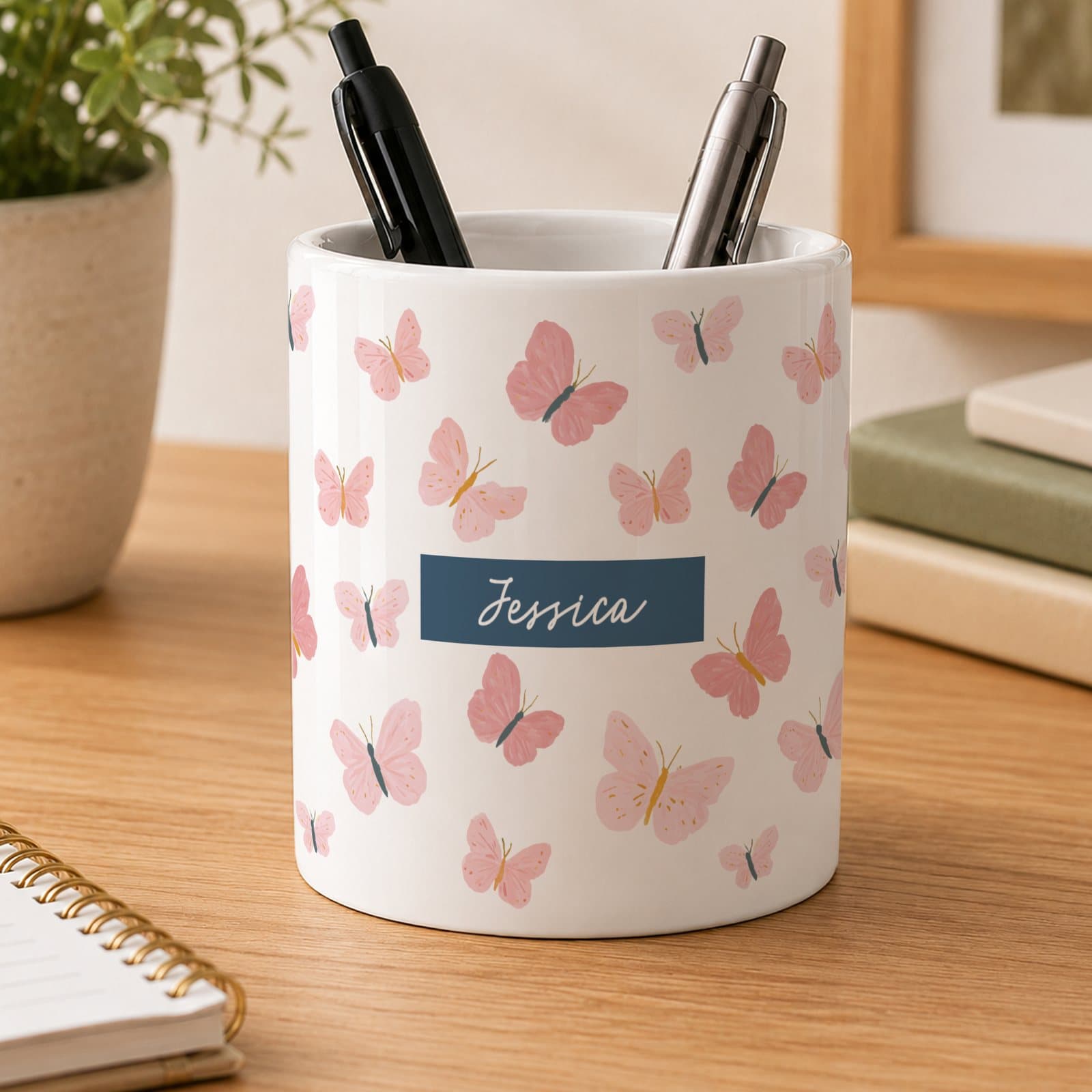 Ceramic butterfly storage pot personalised with a name