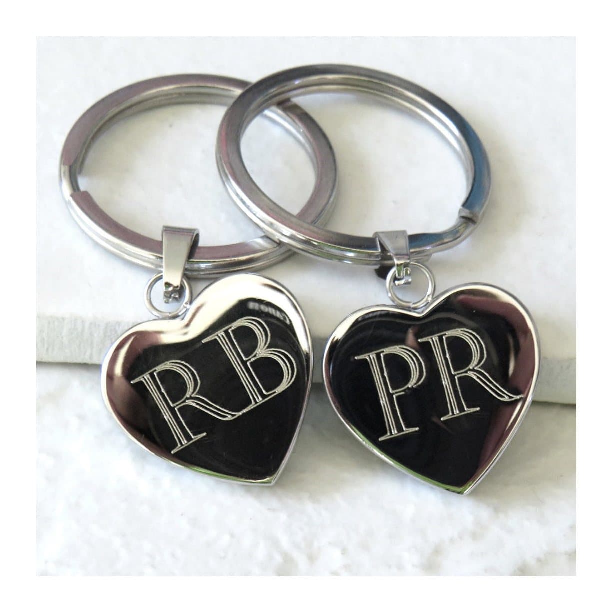 Heart shaped stainless steel keyring with initials engraved.