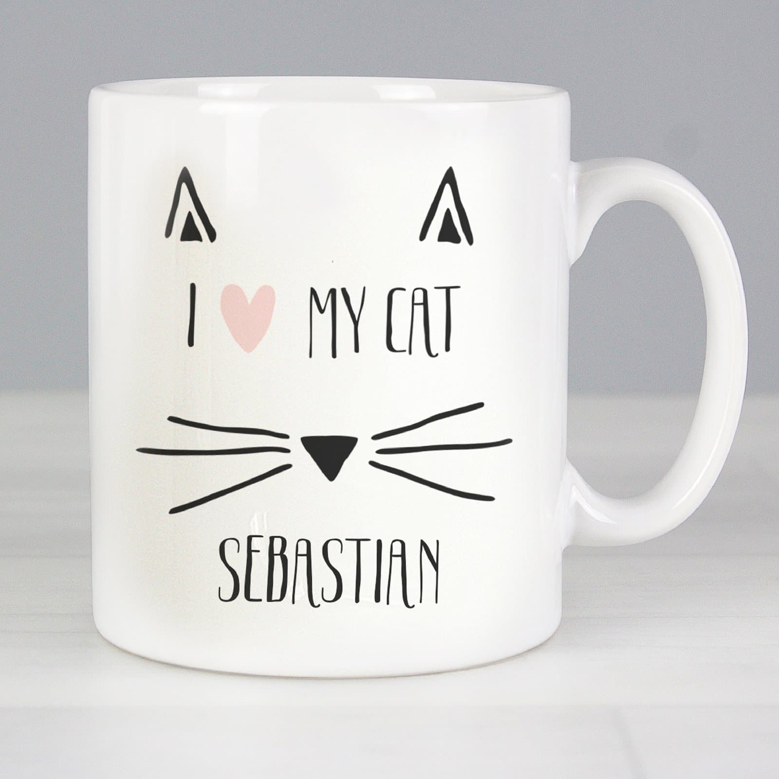 Ceramic cat mug with I heart MY CAT wording on the front