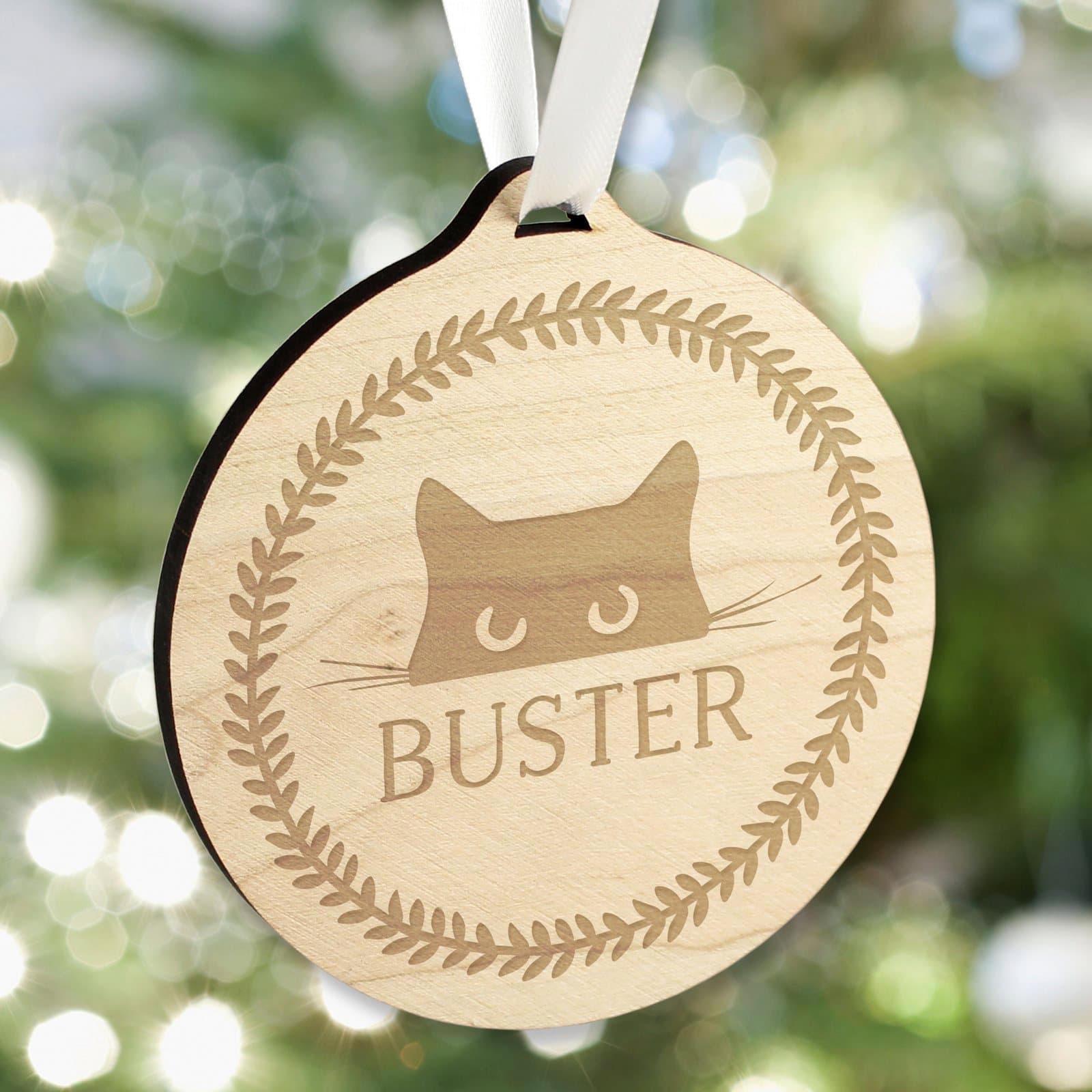 Round wooden cat bauble with ribbon and a name