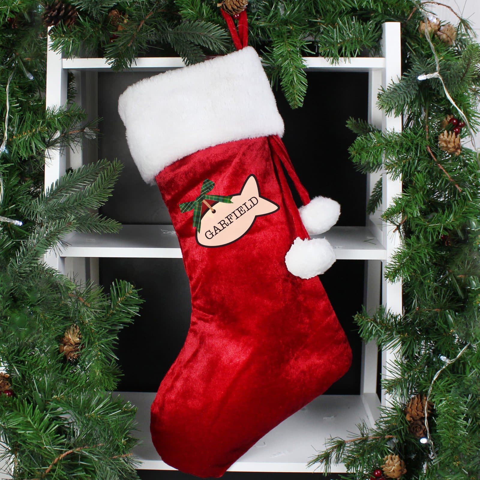 Red velvet cat treats Christmas stocking with white cuff