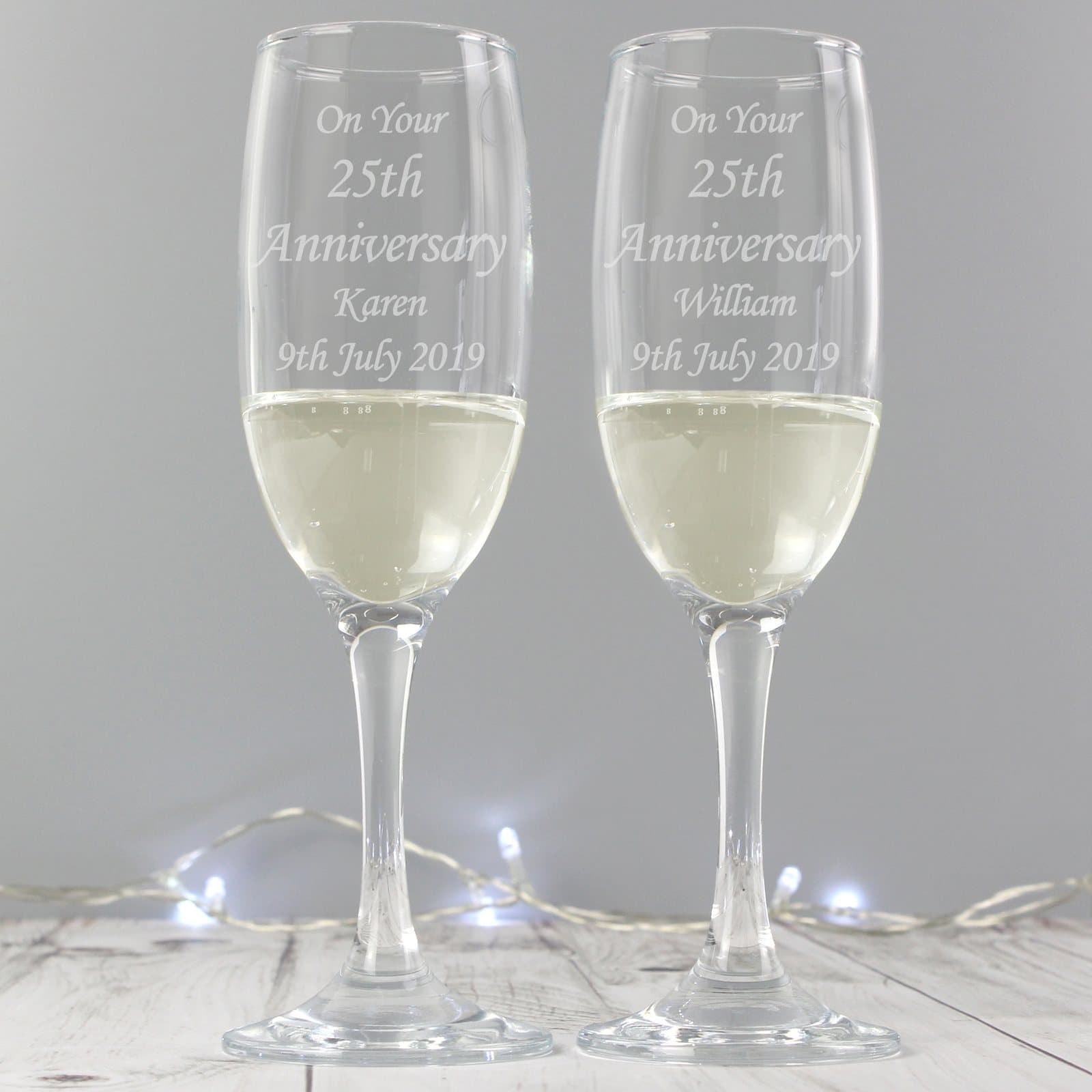 Pair of laser engraved personalised flutes in a silver folding gift box