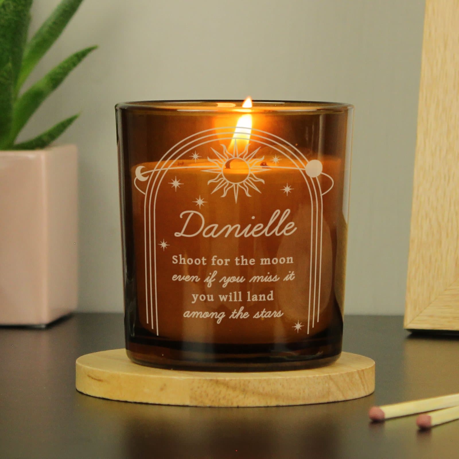 Amber glass celestial candle jar personalised with a name and four lines