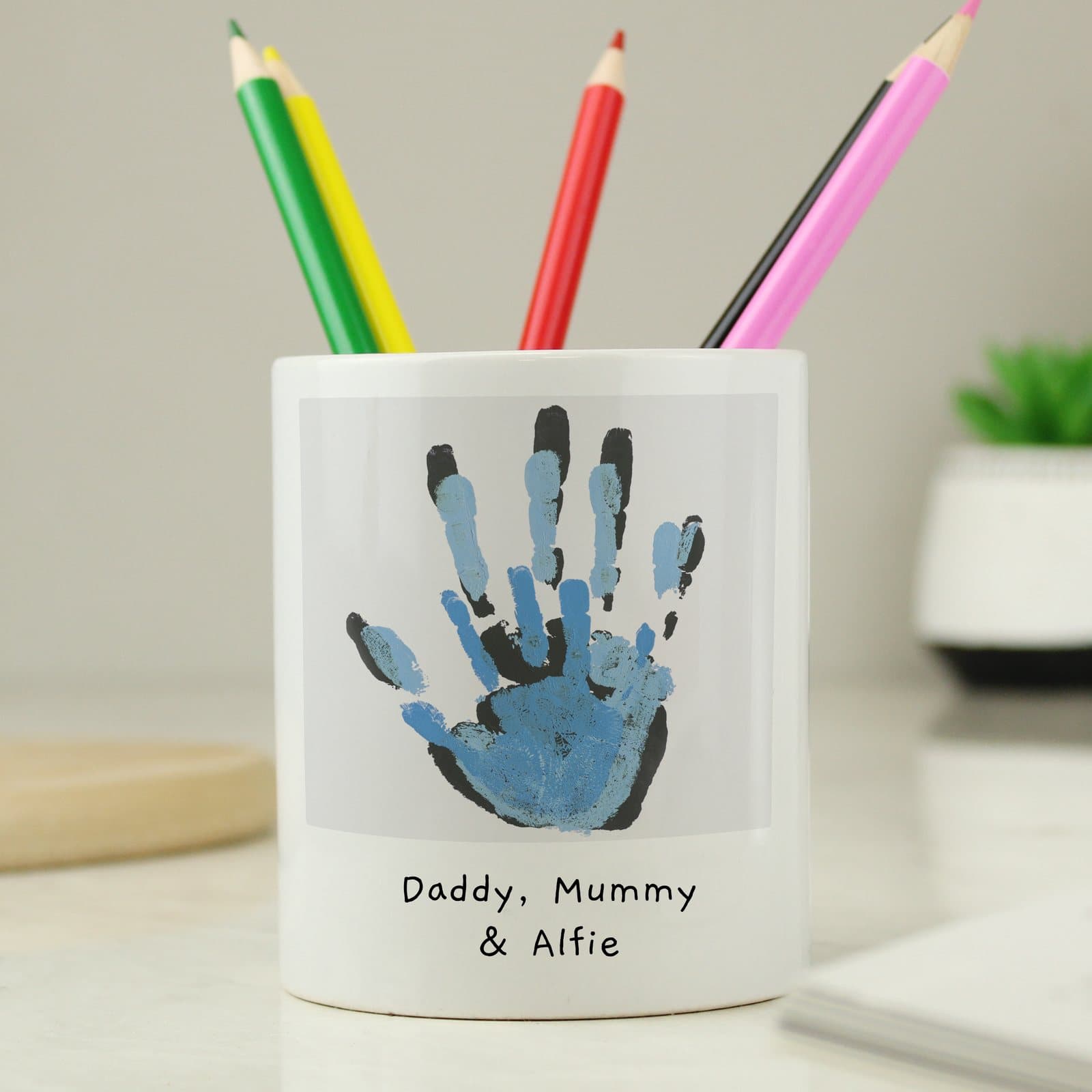 Ceramic storage pot printed with a child's drawing and two lines of personalised text