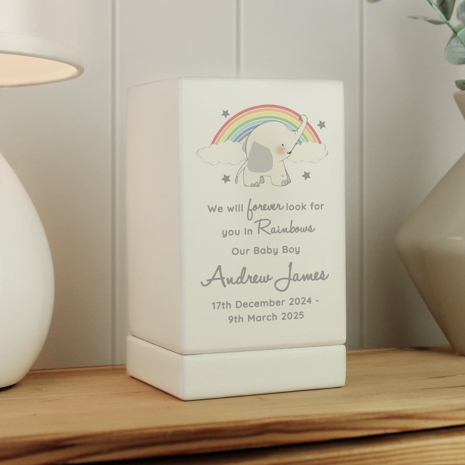 Small wooden memorial urn with an elephant and rainbow design and personalised text