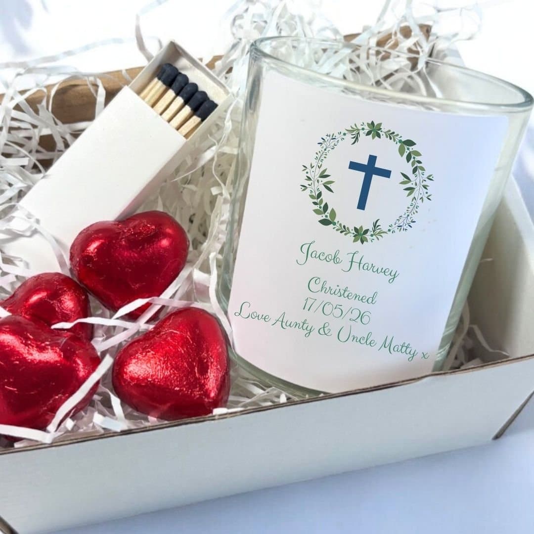 Personalised christening candle with a cross and wreath motif, in a gift box