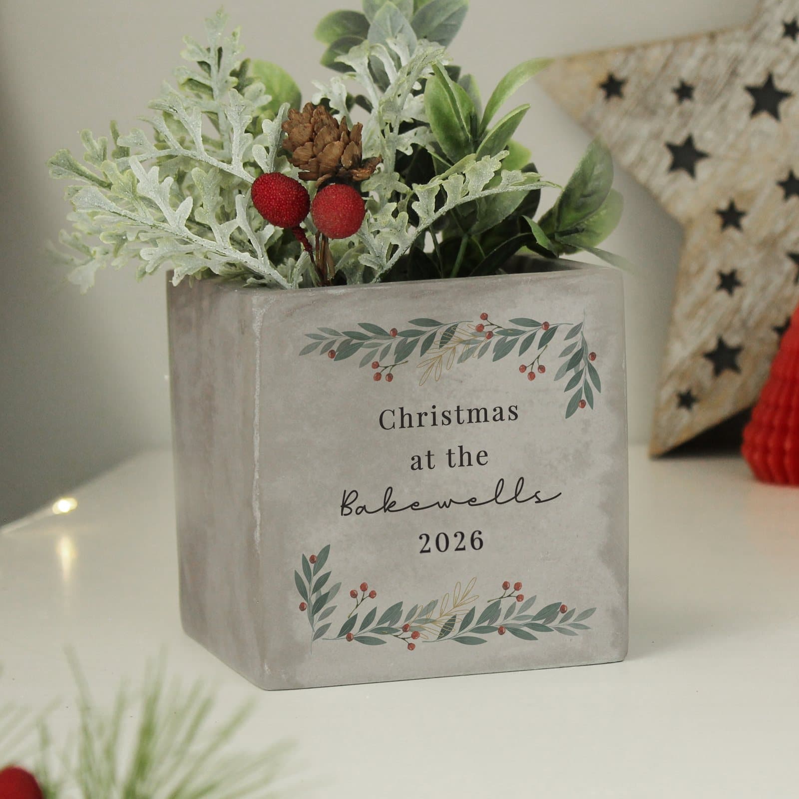 Concrete planter with Christmas foliage design and four lines of personalised text