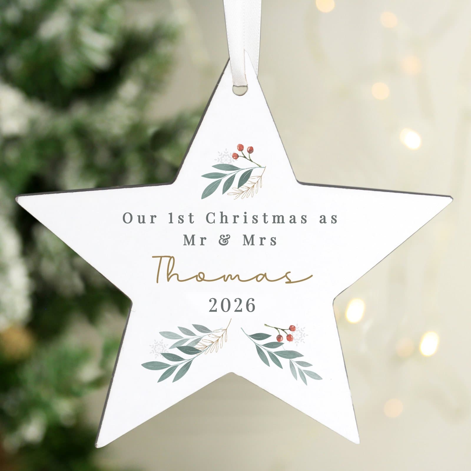 Wooden foliage star Christmas decoration with ribbon and personalised text and year