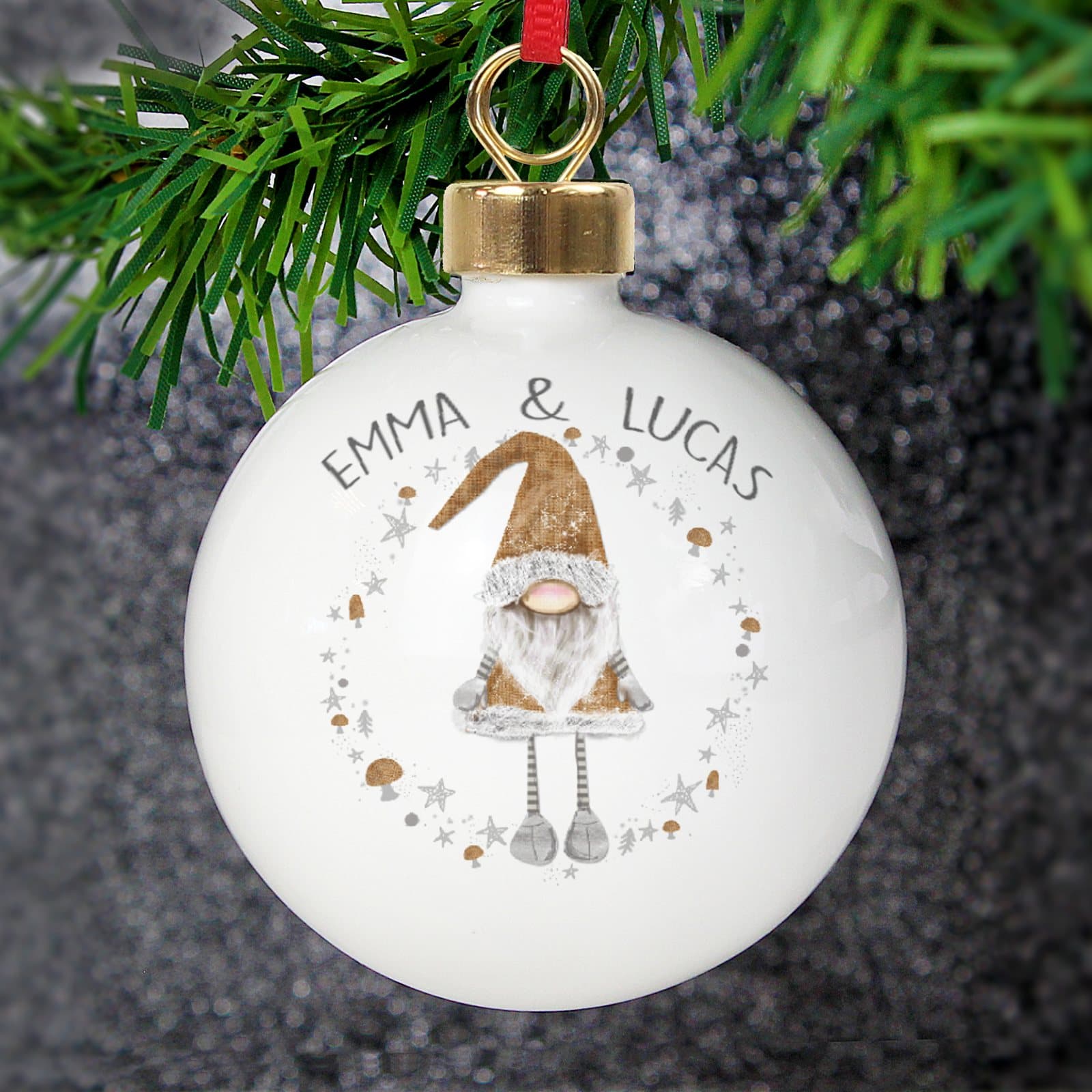 Christmas bauble with a gonk design, a personalised name and a hanging ribbon
