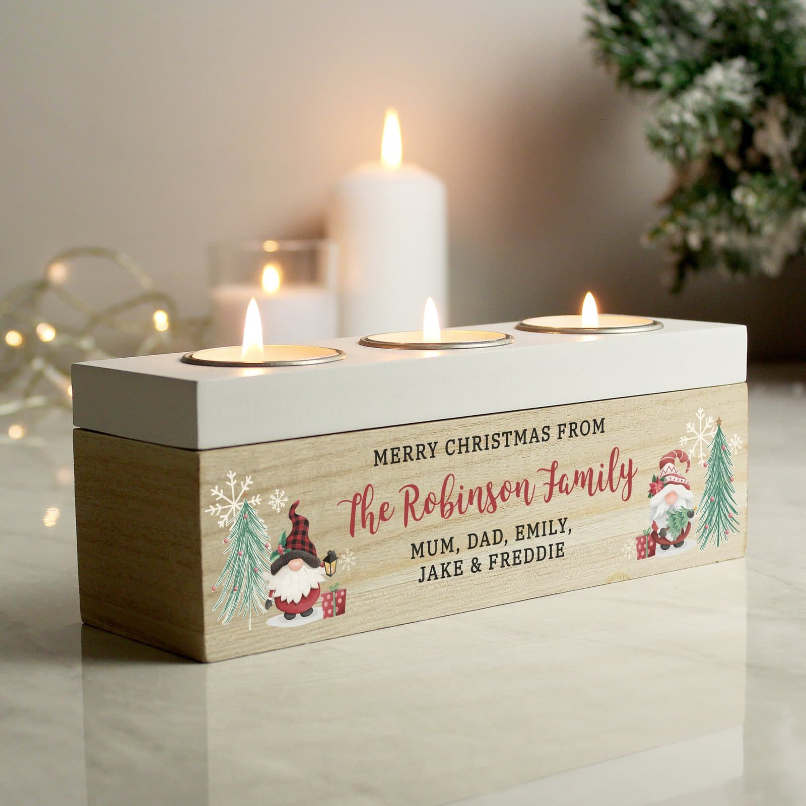 Wooden triple tea light box with a traditional gonk design