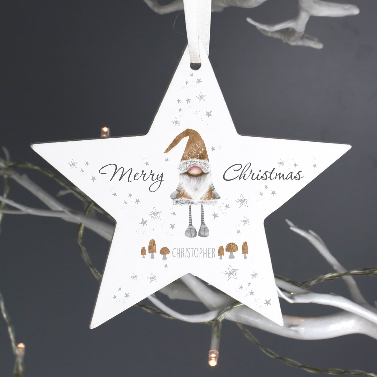 Wooden star Christmas decoration with gonk design and ribbon