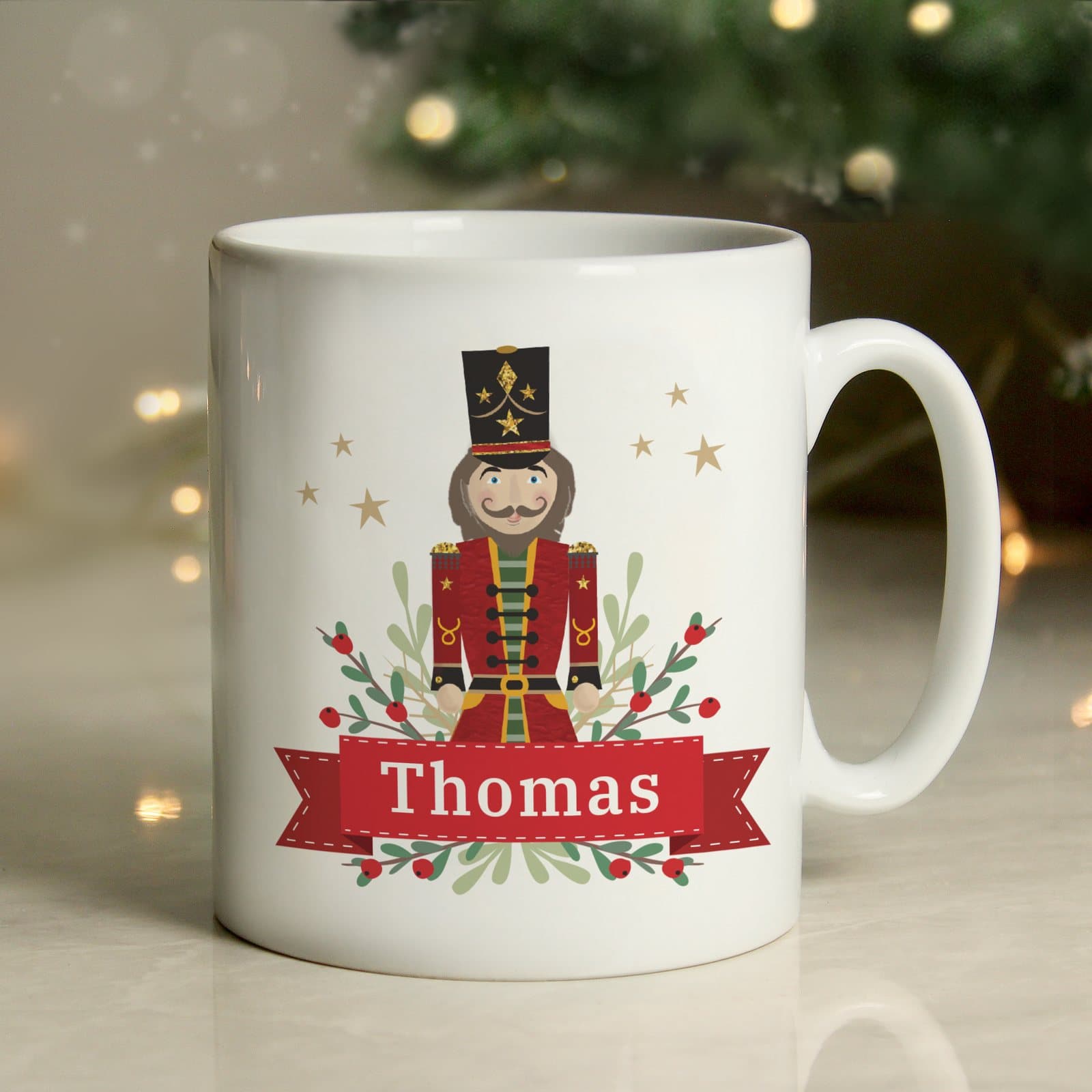Personalised ceramic Christmas mug with a nutcracker design and a name