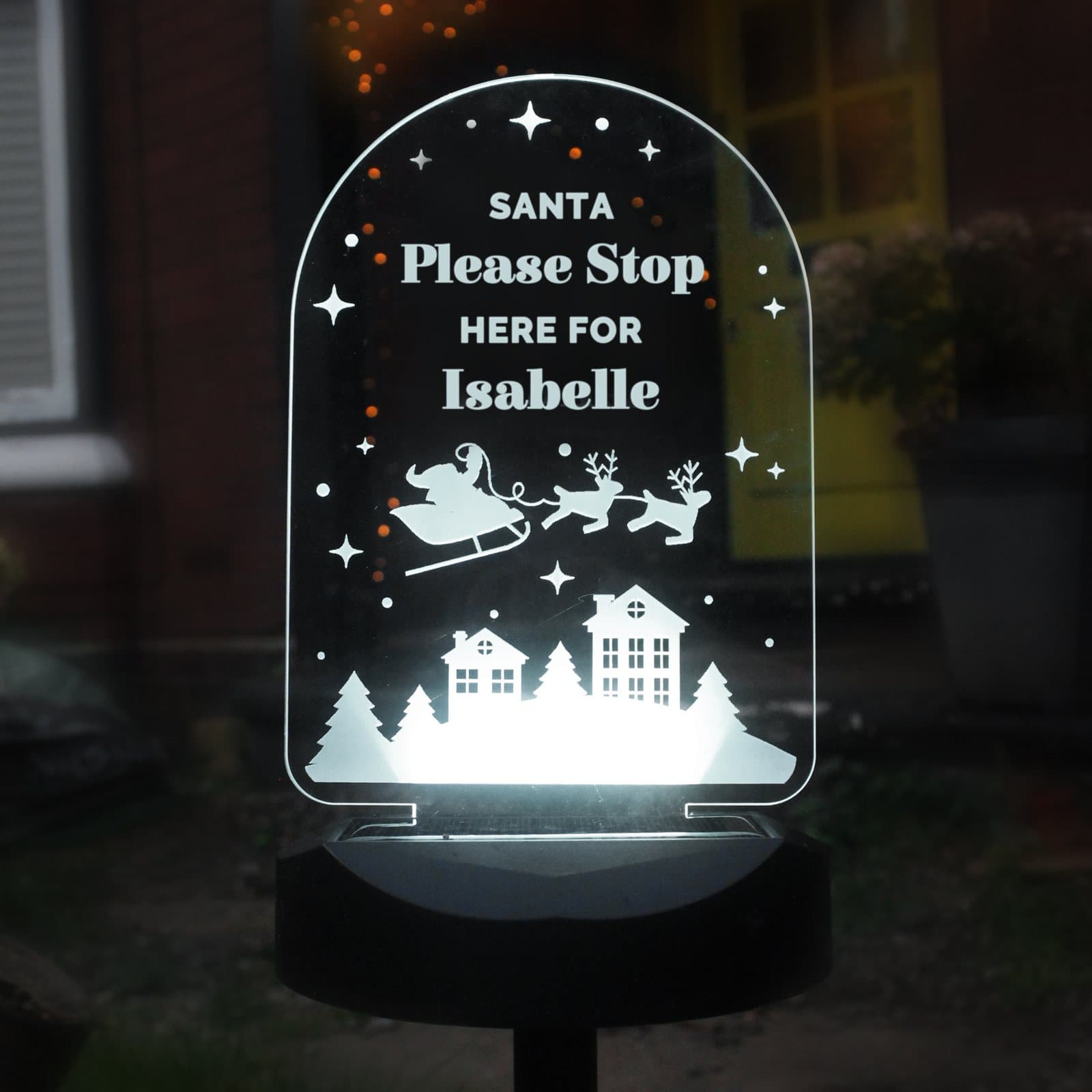 Christmas solar light with a personalised four-line sign on a ground stick