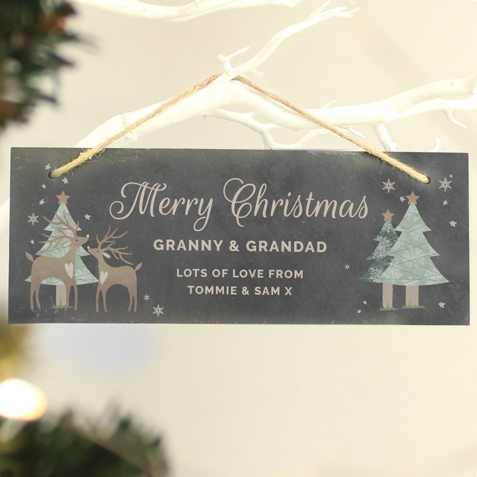 Rectangle slate plaque with a Christmas reindeer design and four lines of text