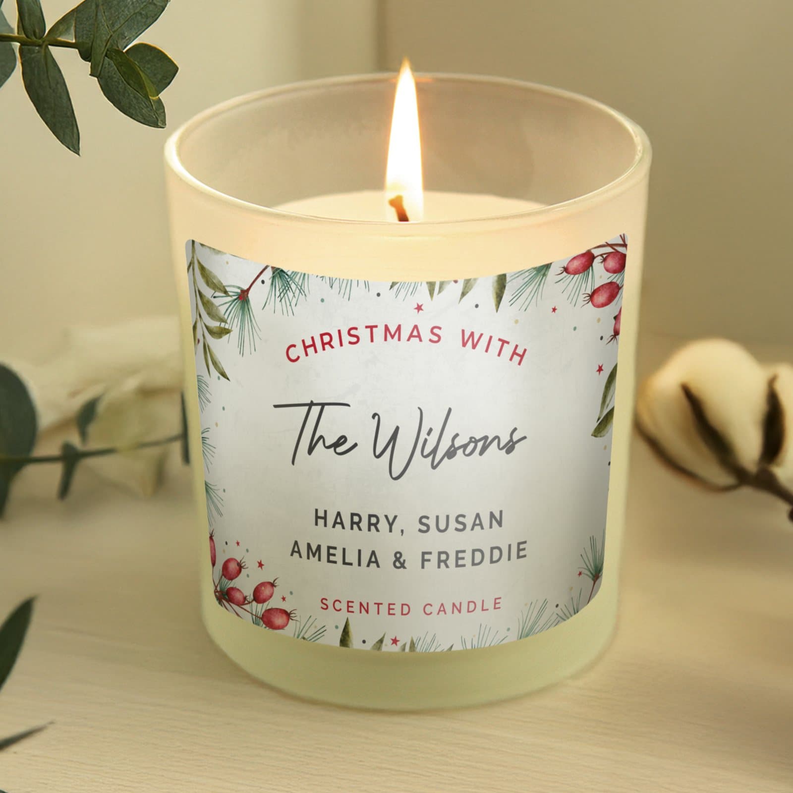 Personalised Christmas scented glass jar candle with a Christmas themed label