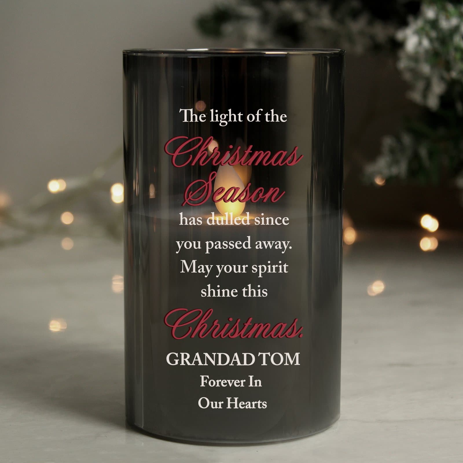 Frosted glass LED candle with an amber flame and personalised text