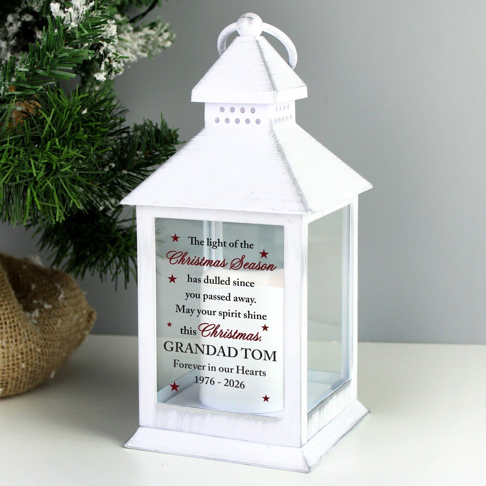 White memorial lantern with a warm flame effect and personalised text