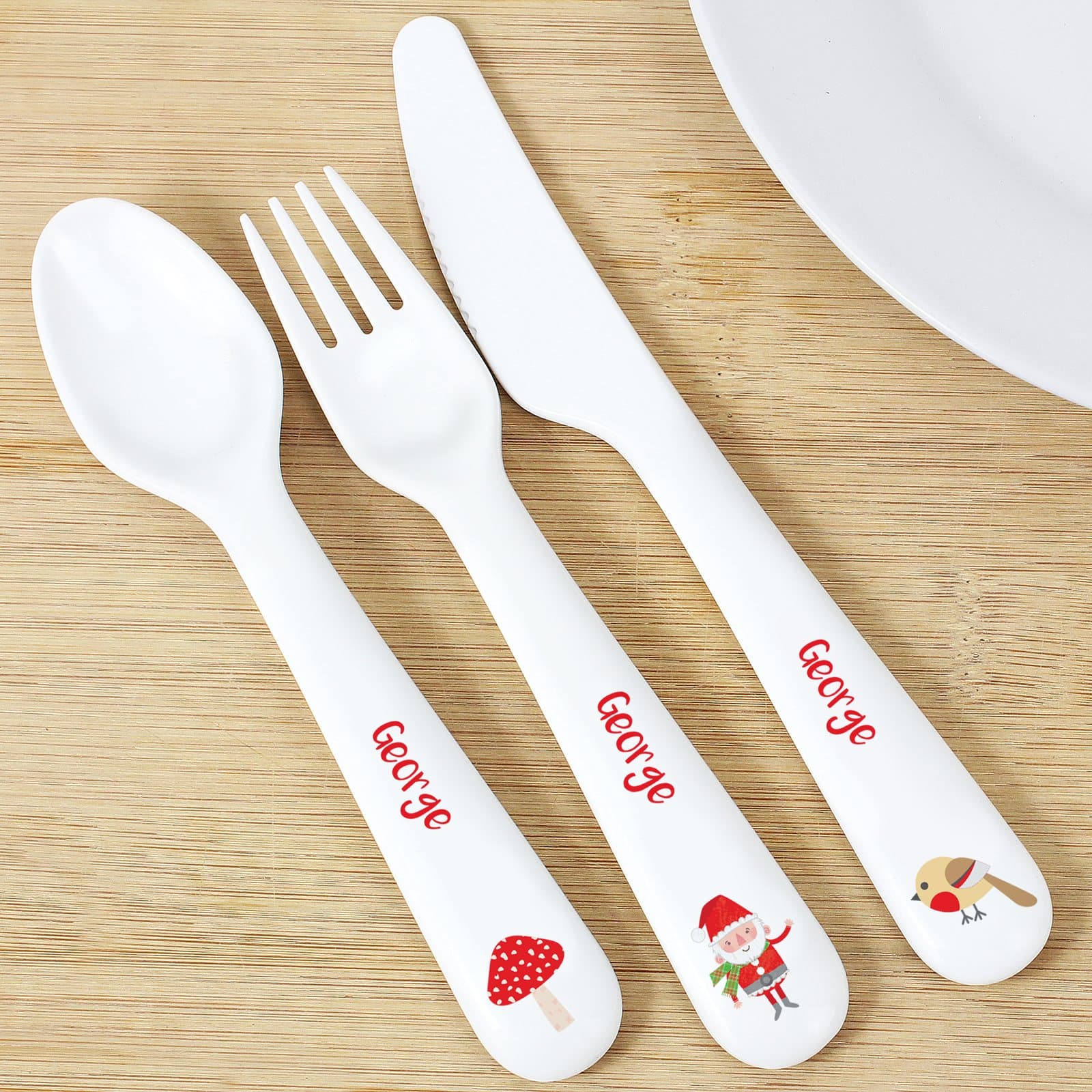 Toadstool Santa three piece plastic cutlery set with spoon, knife and fork