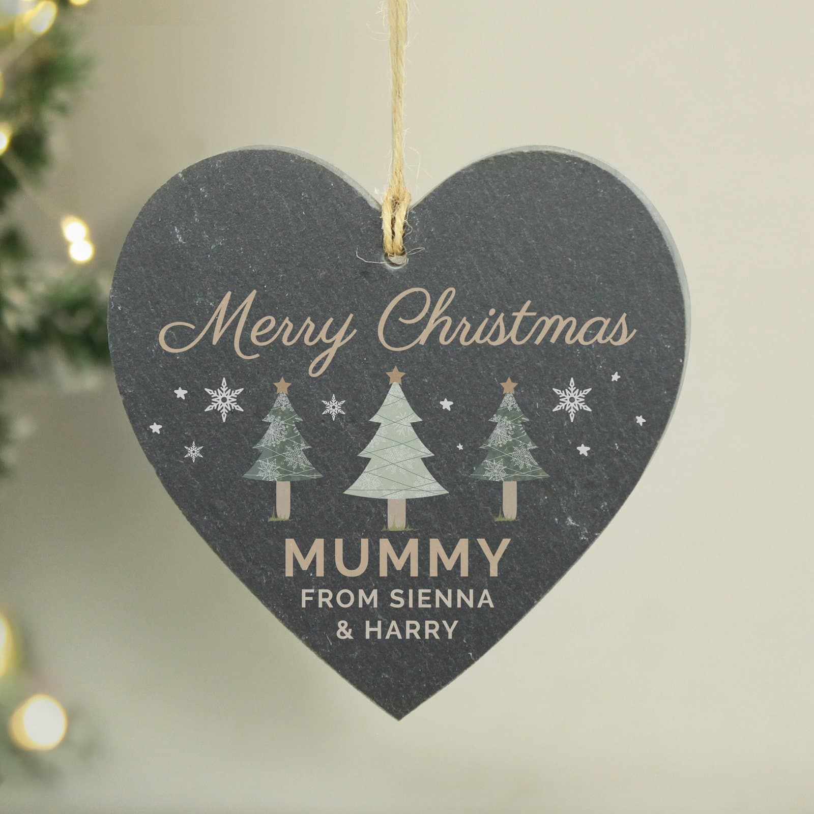 Natural slate heart ornament with a Christmas tree design and rustic string