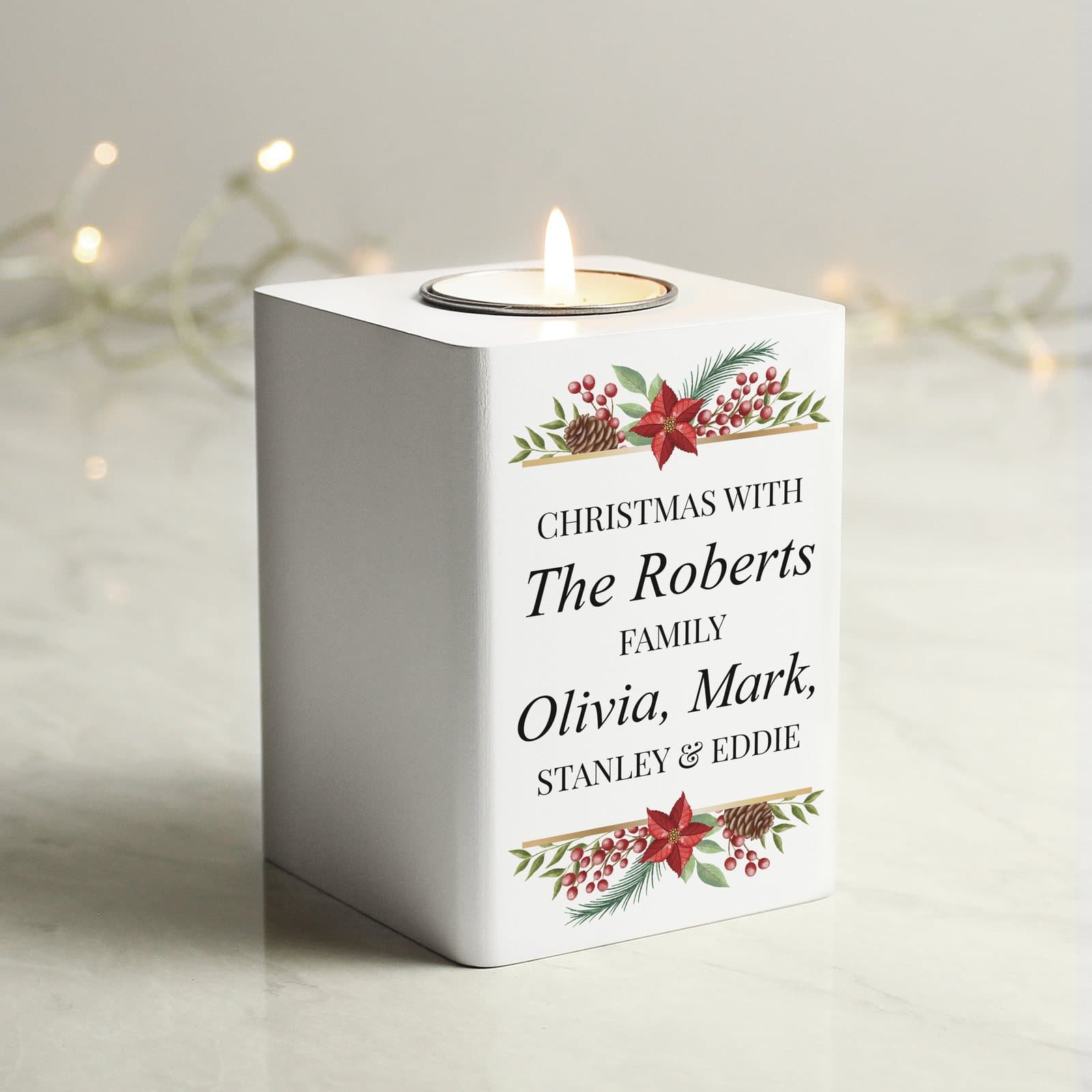 White wooden tea light holder with personalised lines of text