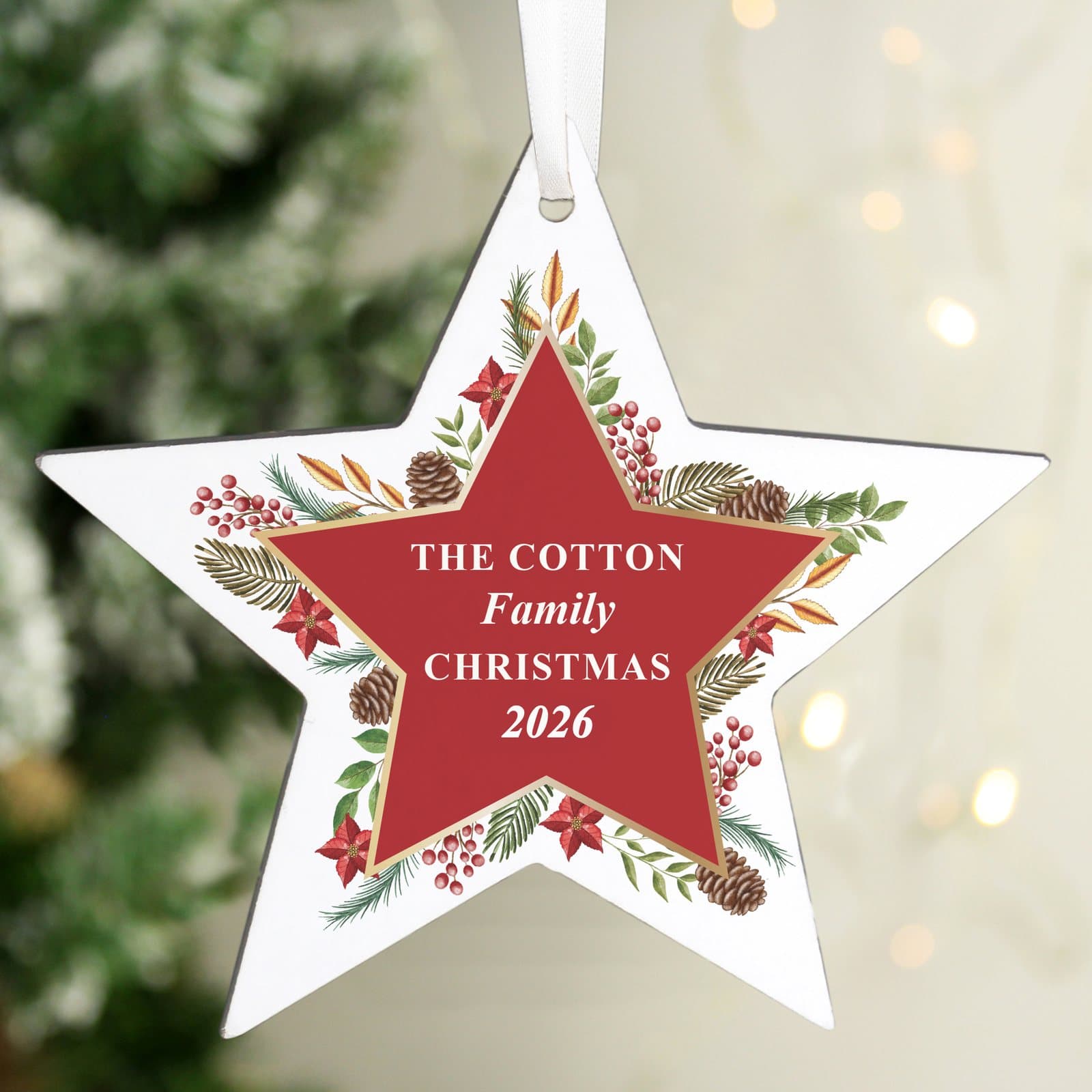 Wooden star decoration with a Christmas wreath design and personalised text