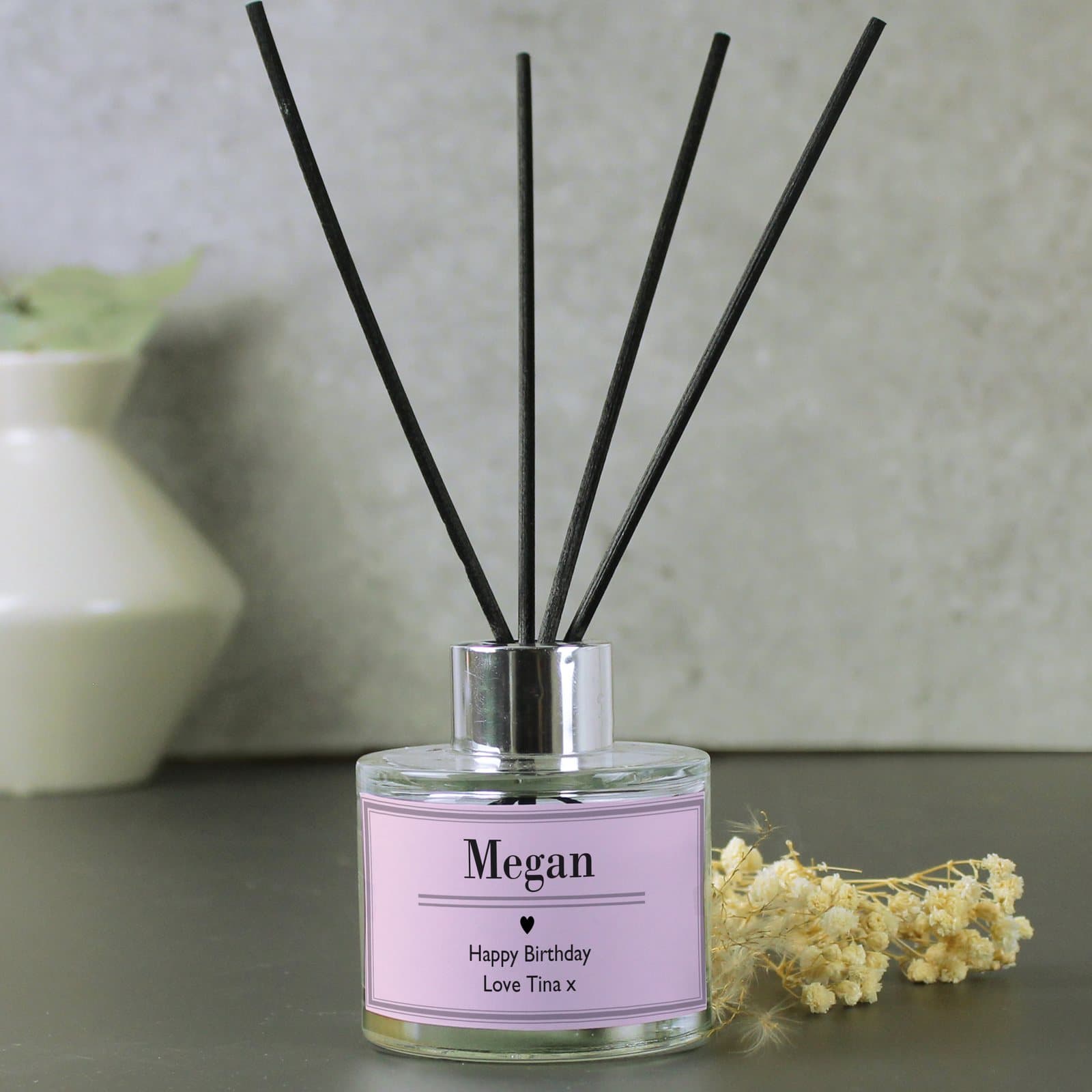Personalised classic pink glass reed diffuser with three lines of text