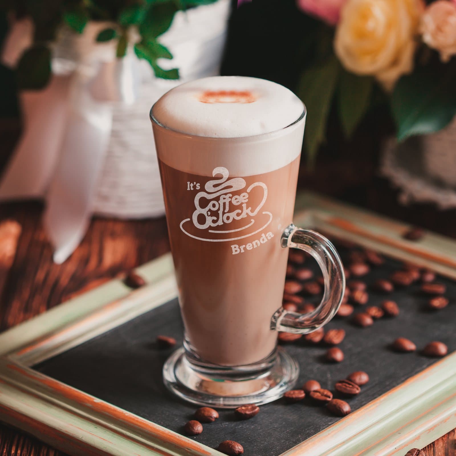 Latte glass with the words It's Coffee O Clock and a personalised name