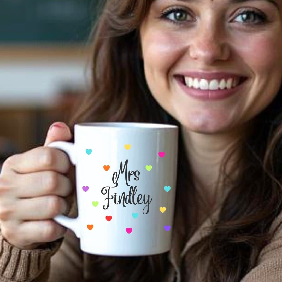 Personalised mug with a colourful hearts design