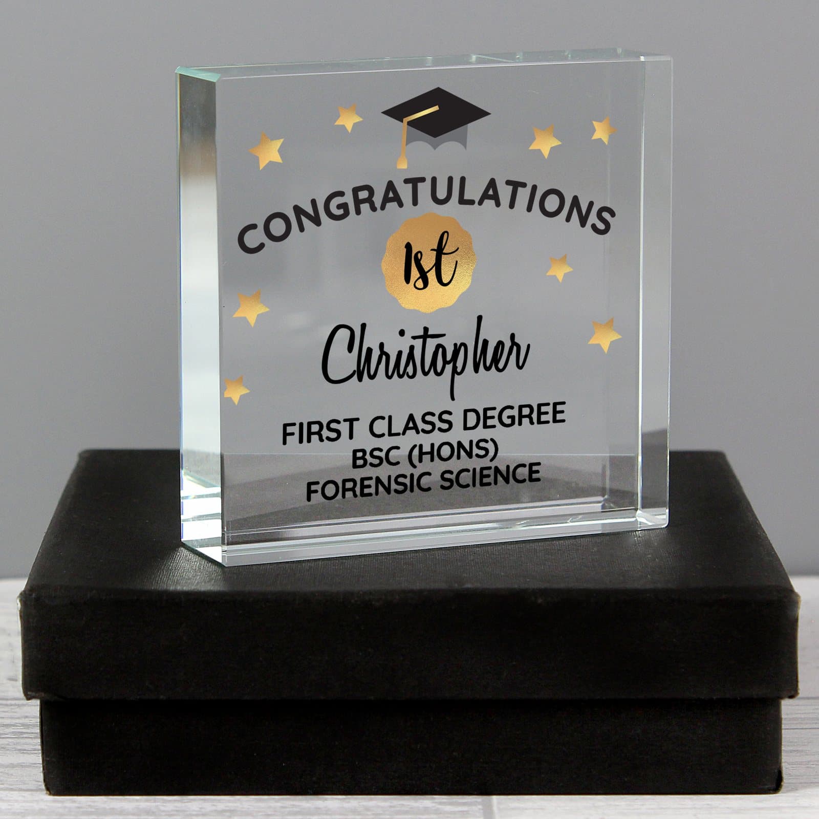 Glass graduation token personalised with a grade, a name and a message