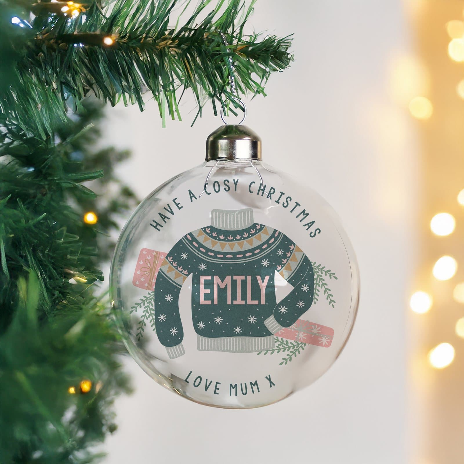 Cosy Christmas glass bauble personalised with a name and two lines of text
