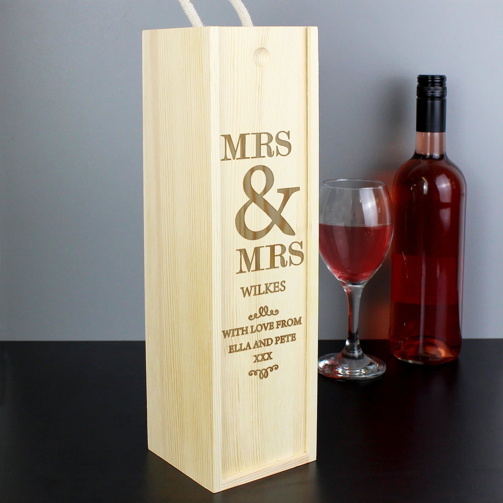 Wooden wine bottle box with a sliding front and string handle