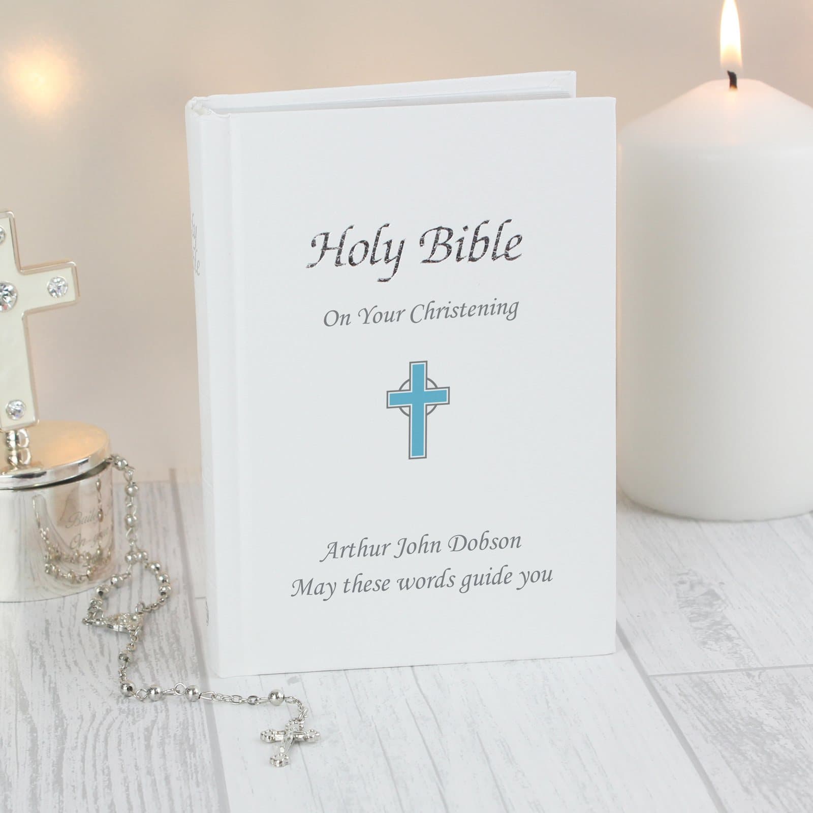Personalised blue or pink cross Bible with a leatherette cover