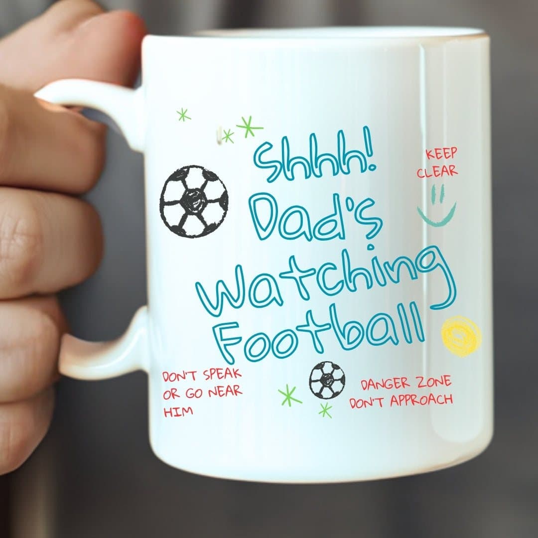 Personalised Dad's Watching Football ceramic mug showing its design