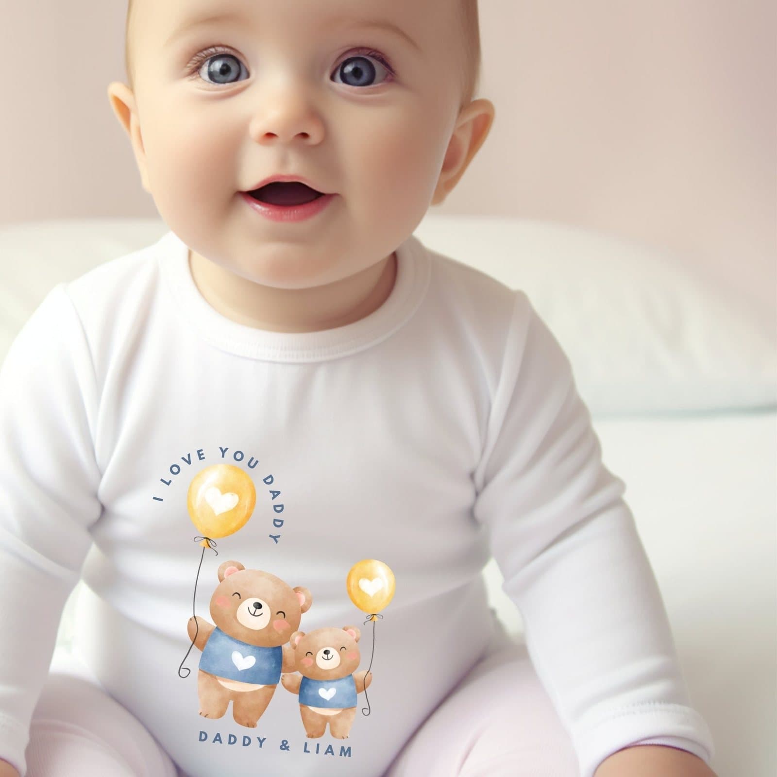 Personalised baby babygrow with a Daddy and Little Bear design holding balloons