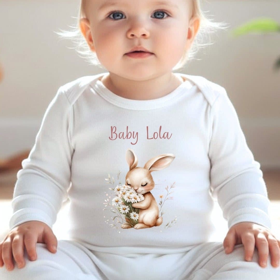 Personalised daisy bunny baby grow, vest or bib with a bunny surrounded by daisies