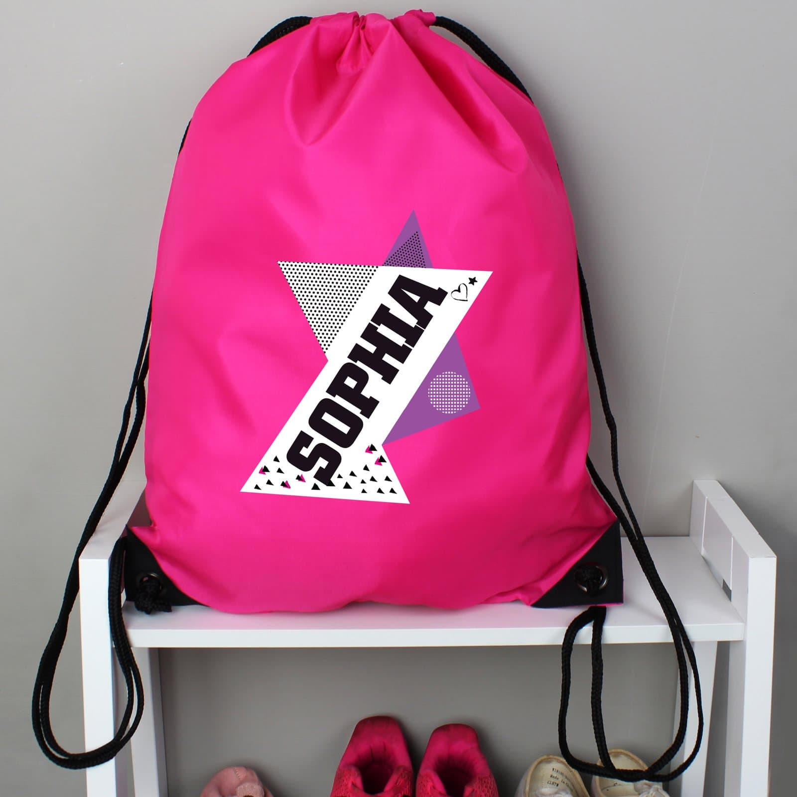 Pink polyester drawstring dance kit bag personalised with a name
