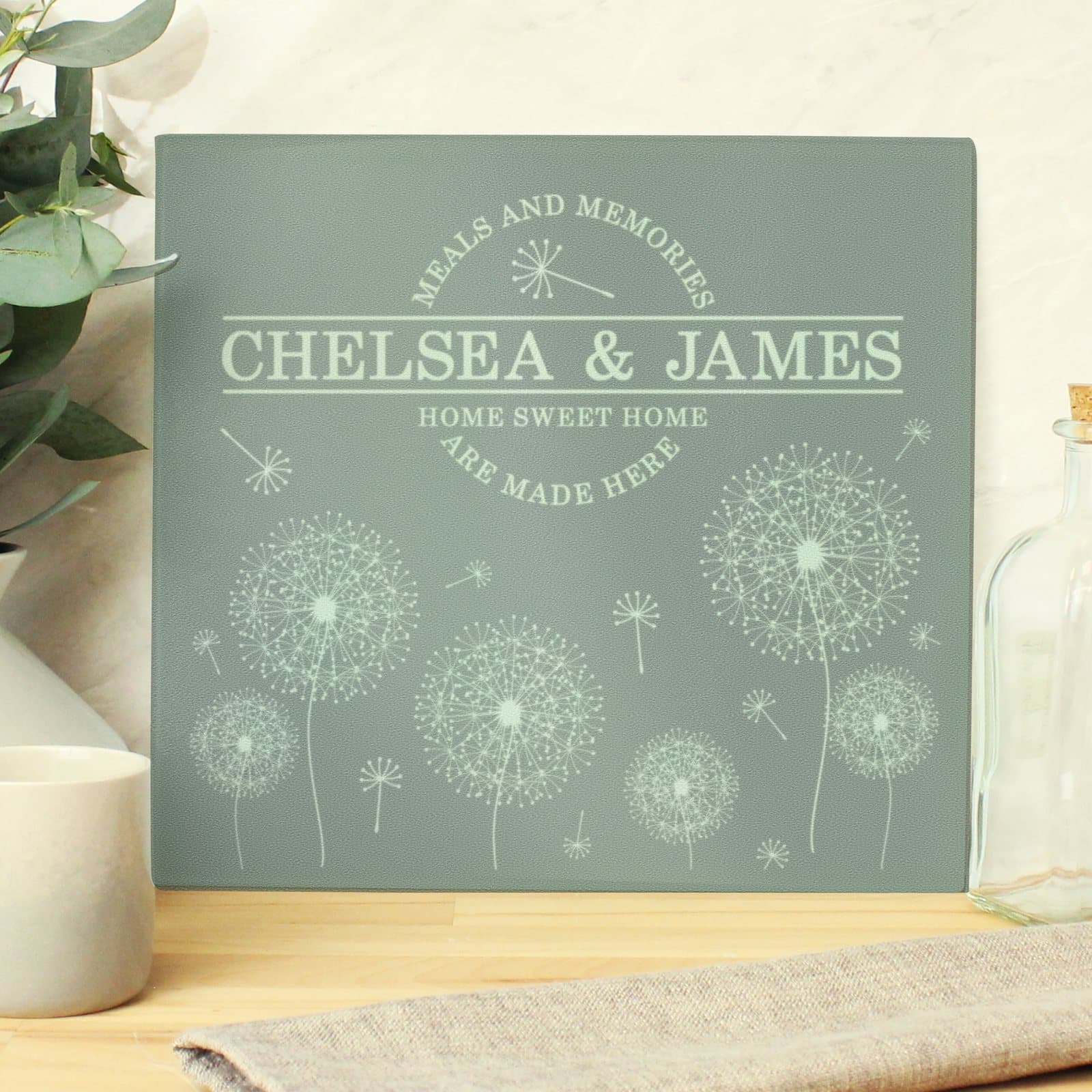 Dandelion glass chopping board with MEALS AND MEMORIES, ARE MADE HERE text