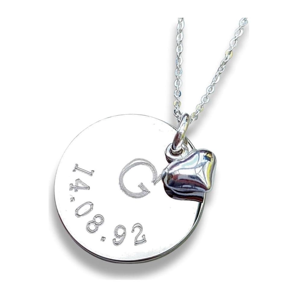 Personalised date and letter necklace with a silver charm and mini heart on a chain
