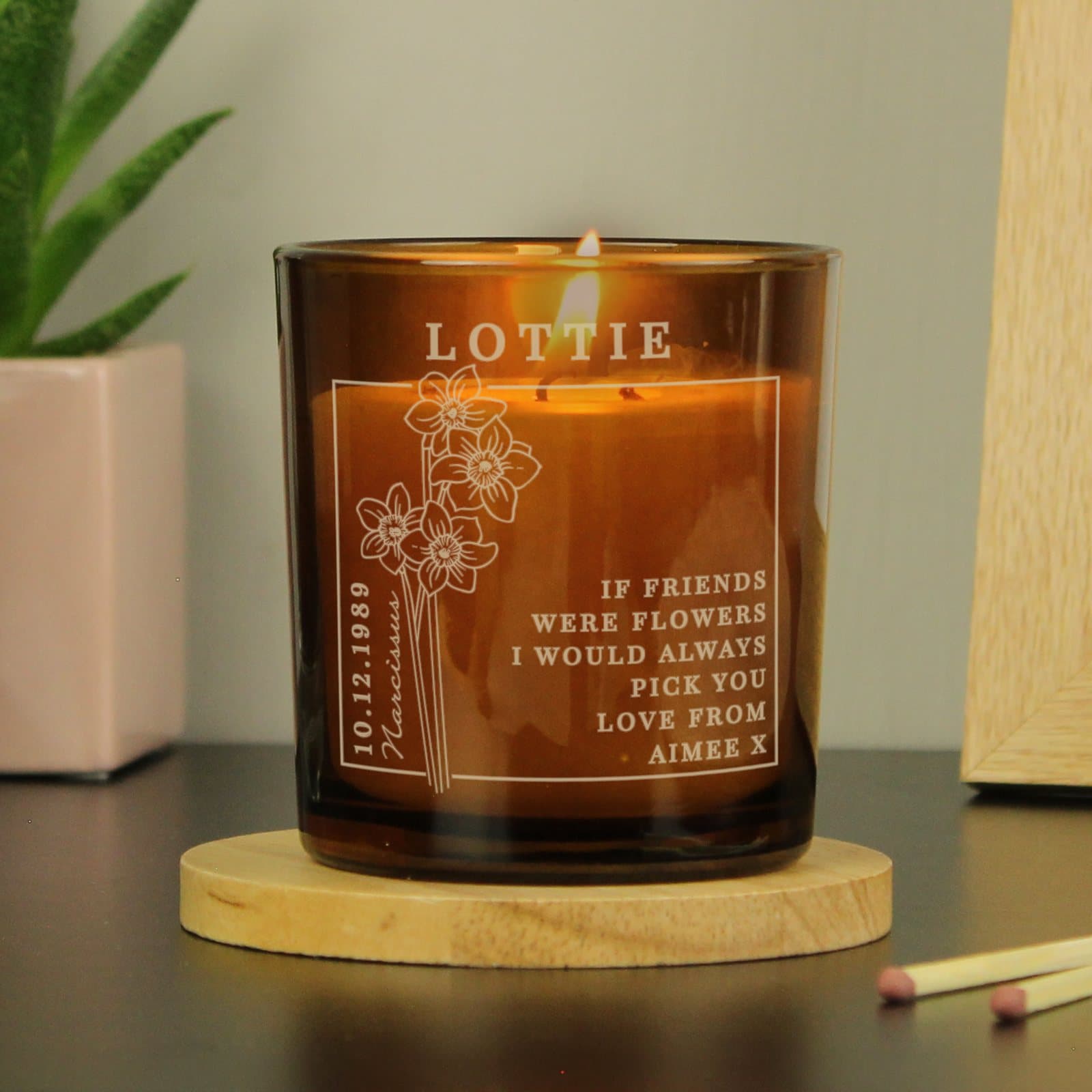 Amber glass candle jar with December birth flower design, name and date
