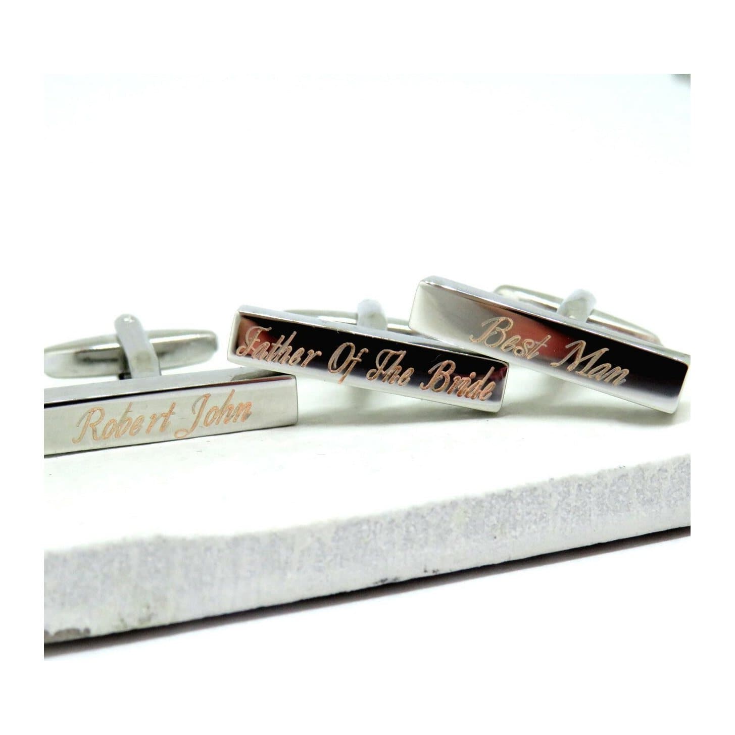 Thin silver coloured bar cufflinks with deco script lettering