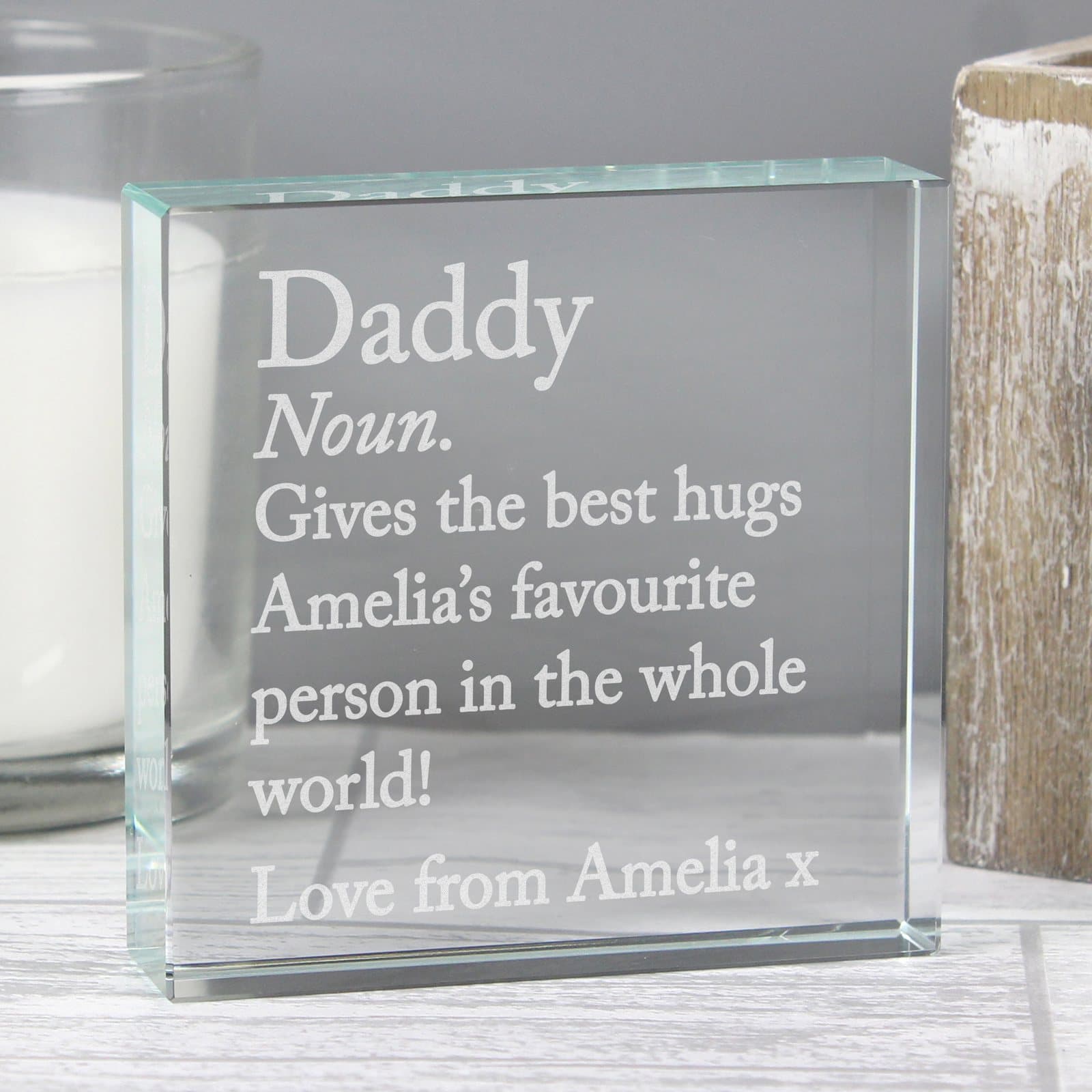 Crystal token with dictionary definition text and black gift box