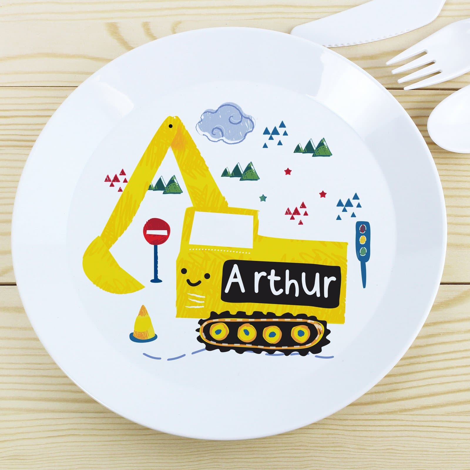 Plastic children's plate with a digger design and a personalised name
