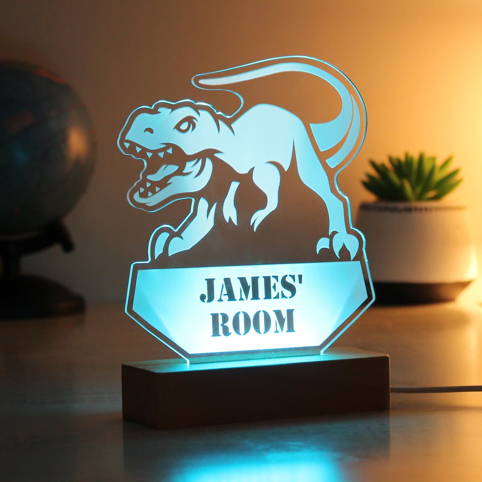Personalised T-rex LED light on a wooden base